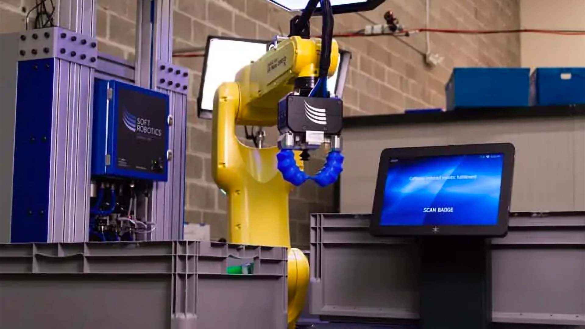 A robot sorting goods into various bins