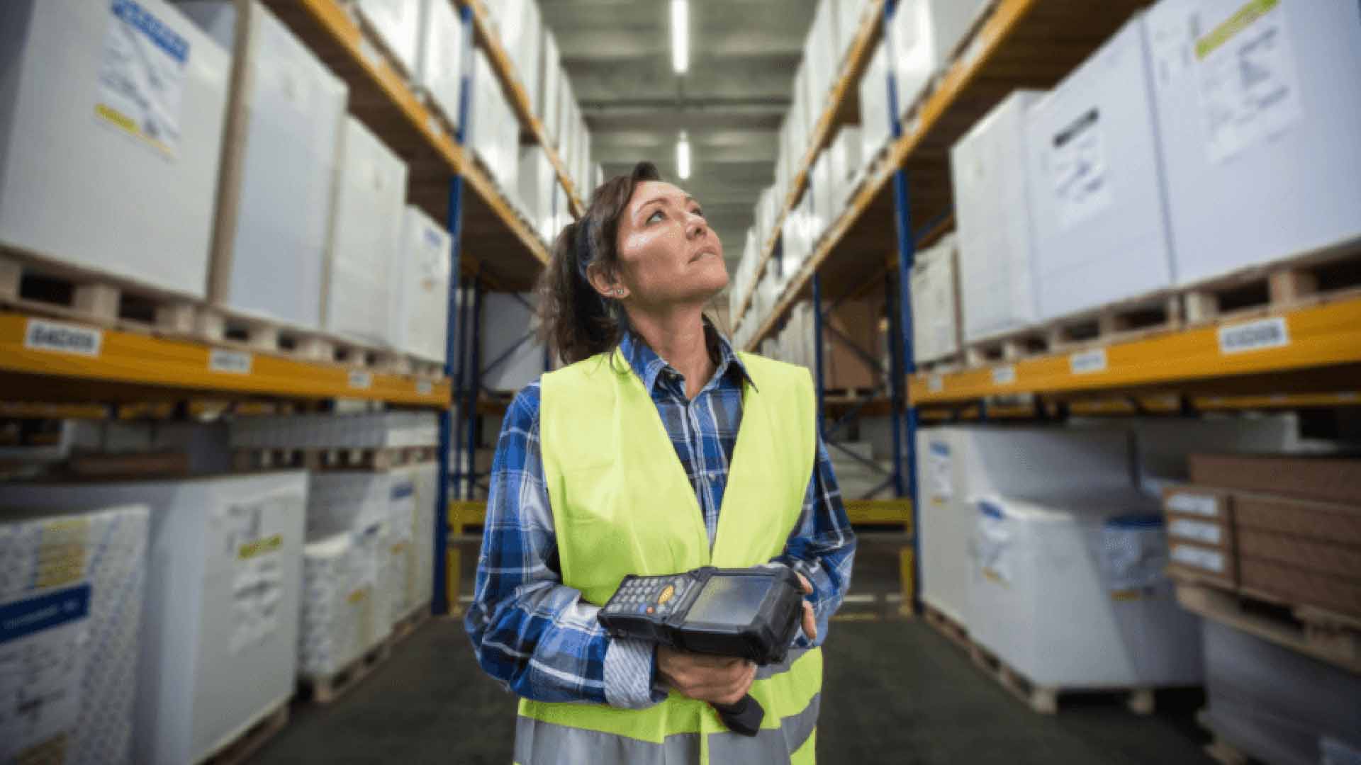 warehouse picker in between racks