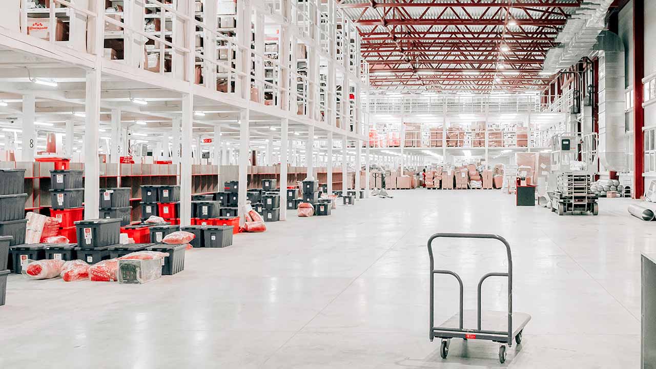 Material handling equipment and large paths for people to move through a fulfillment center