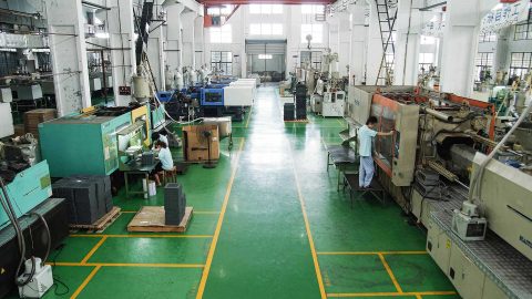 Plastic Injection Molding Big Machines Shop An injection molding contract manufacturing workshop with several large machines