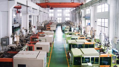 AMS Plastic Injection Injection molding workshop with several small machines